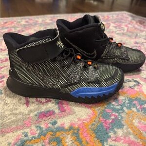 Nike Kids Black Sneakers with Blue Accent and Orange Details